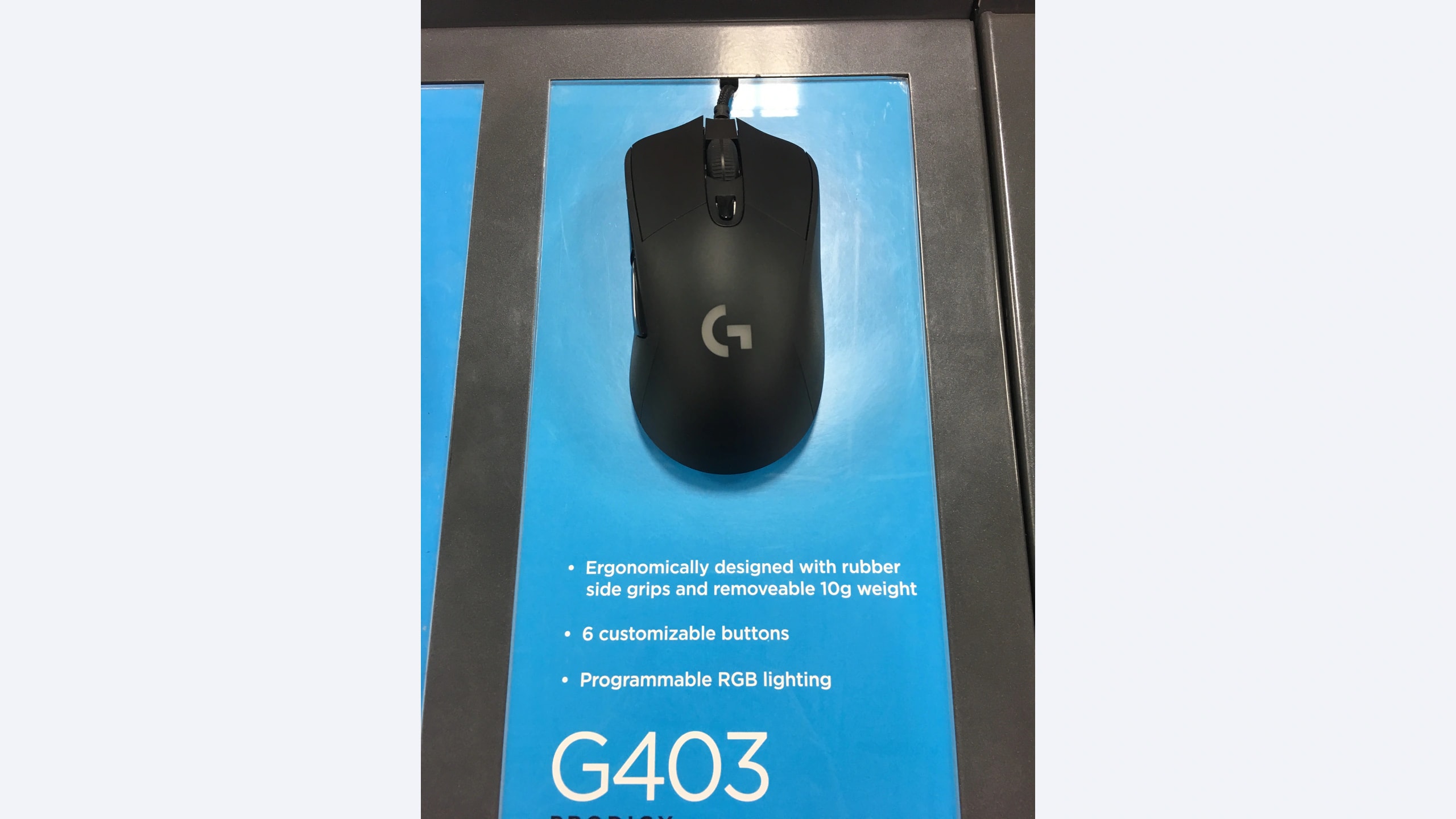 Original Logitech G403 Prodigy wired mouse on its 2016 display